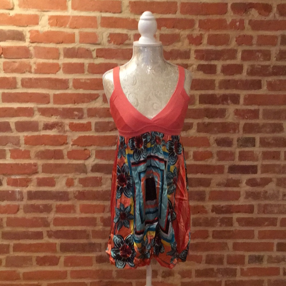 Bebe Knit/pattern silk mini dress w/bubble hem.
